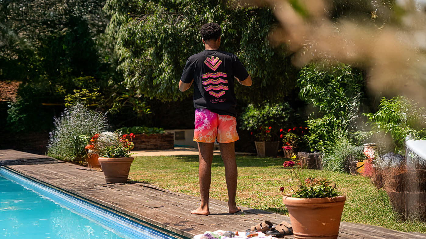 Off the clock, by the pool in the Anniversary shorts