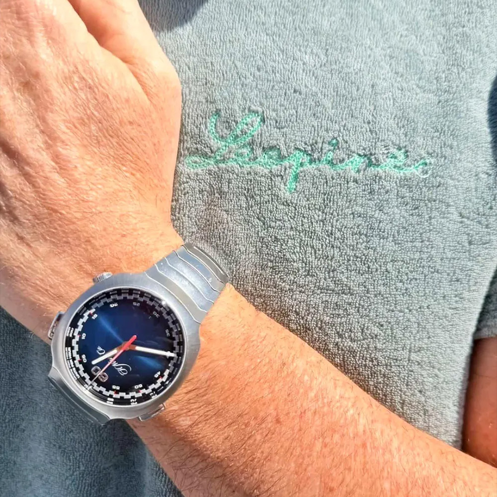 Leopine terry on the wrist with a steel watch
