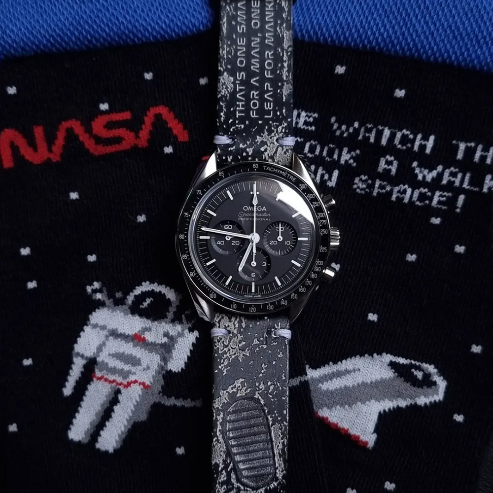 A Speedmaster resting on Leopine NASA socks